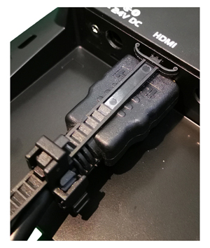 Attachable cable clamp to prevent cable disconnection